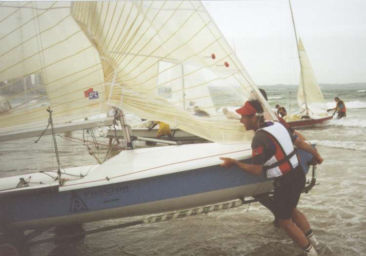 Krister and boat on the beach